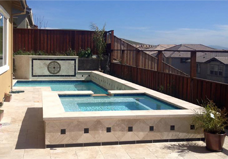 Custom designed backyard pool and hot tub